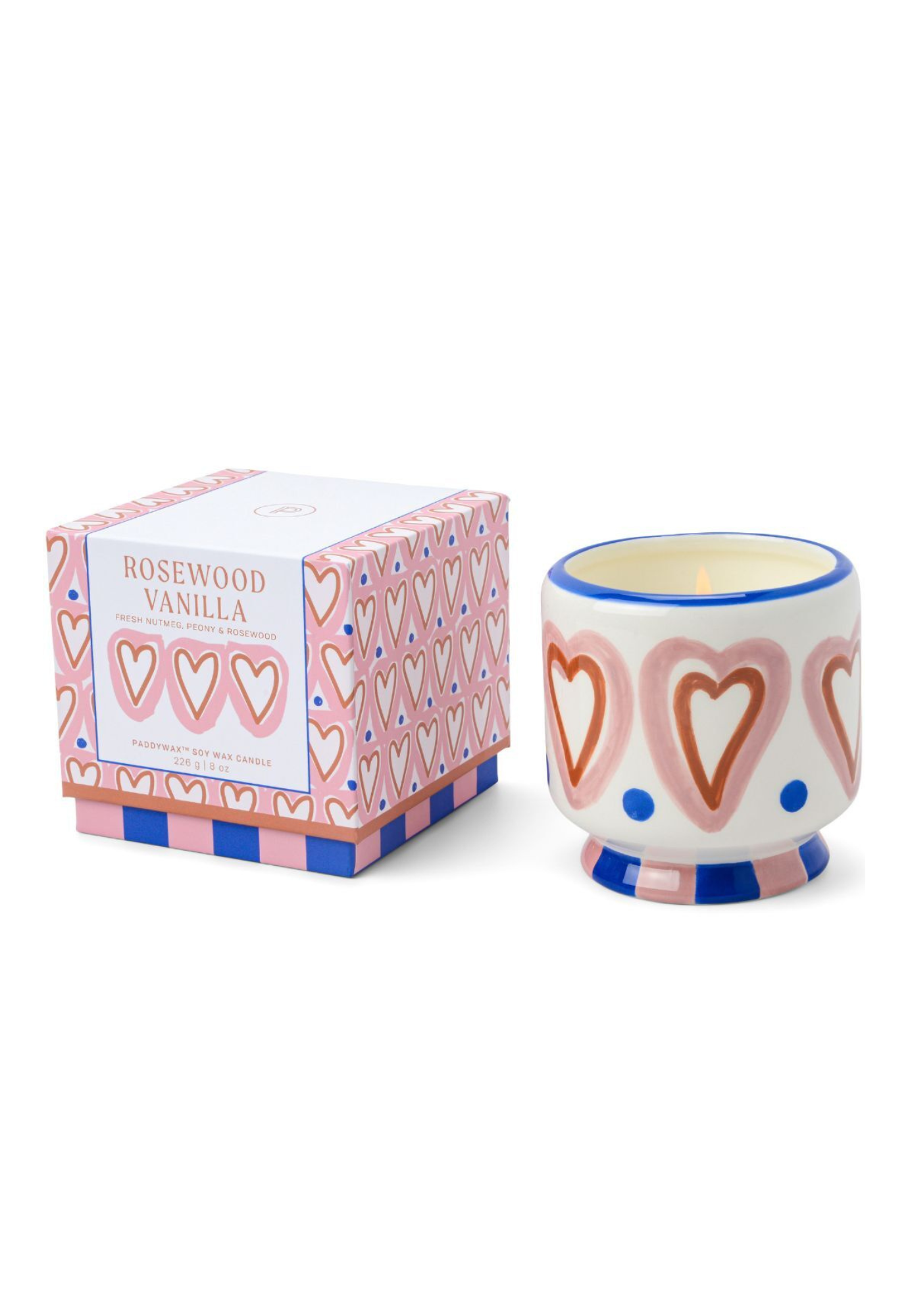 Candle with heart design and matching box on a white background