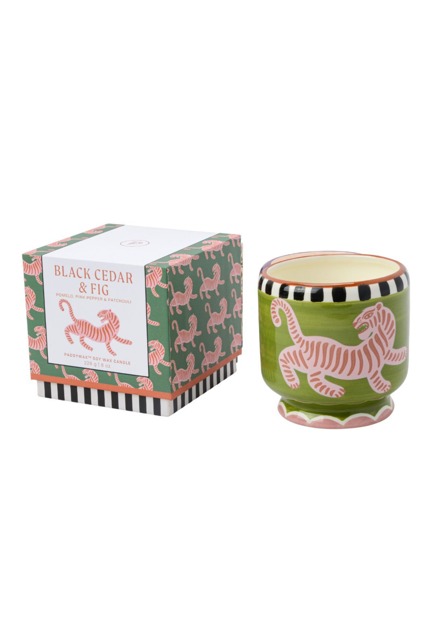 Green candle with pink tiger design and matching box on a white background