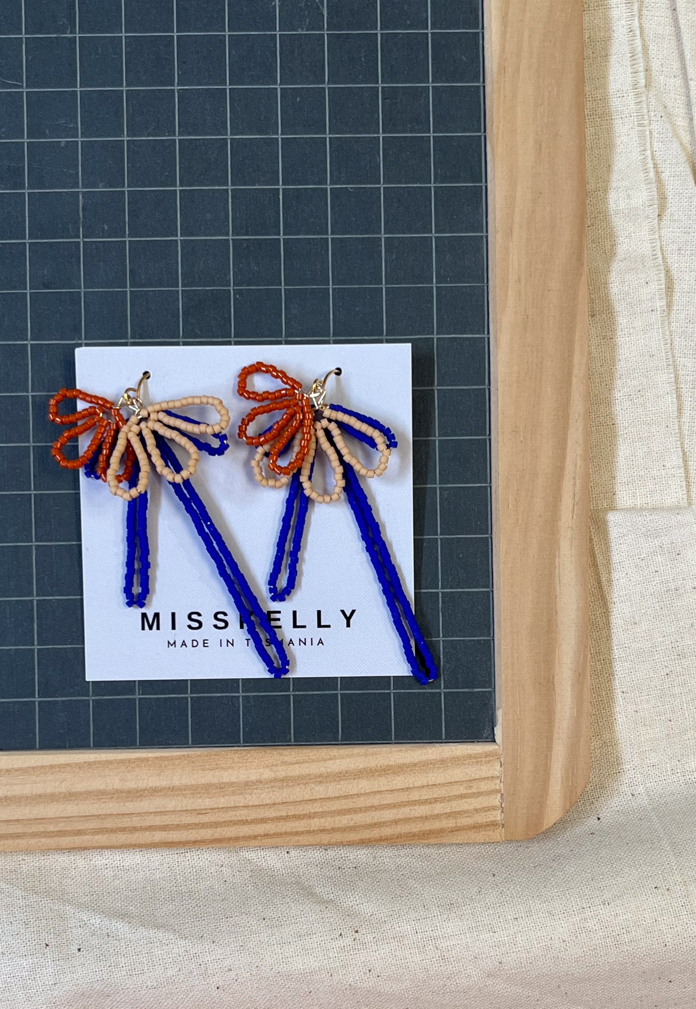 misskelly - triple bloom beaded earrings
