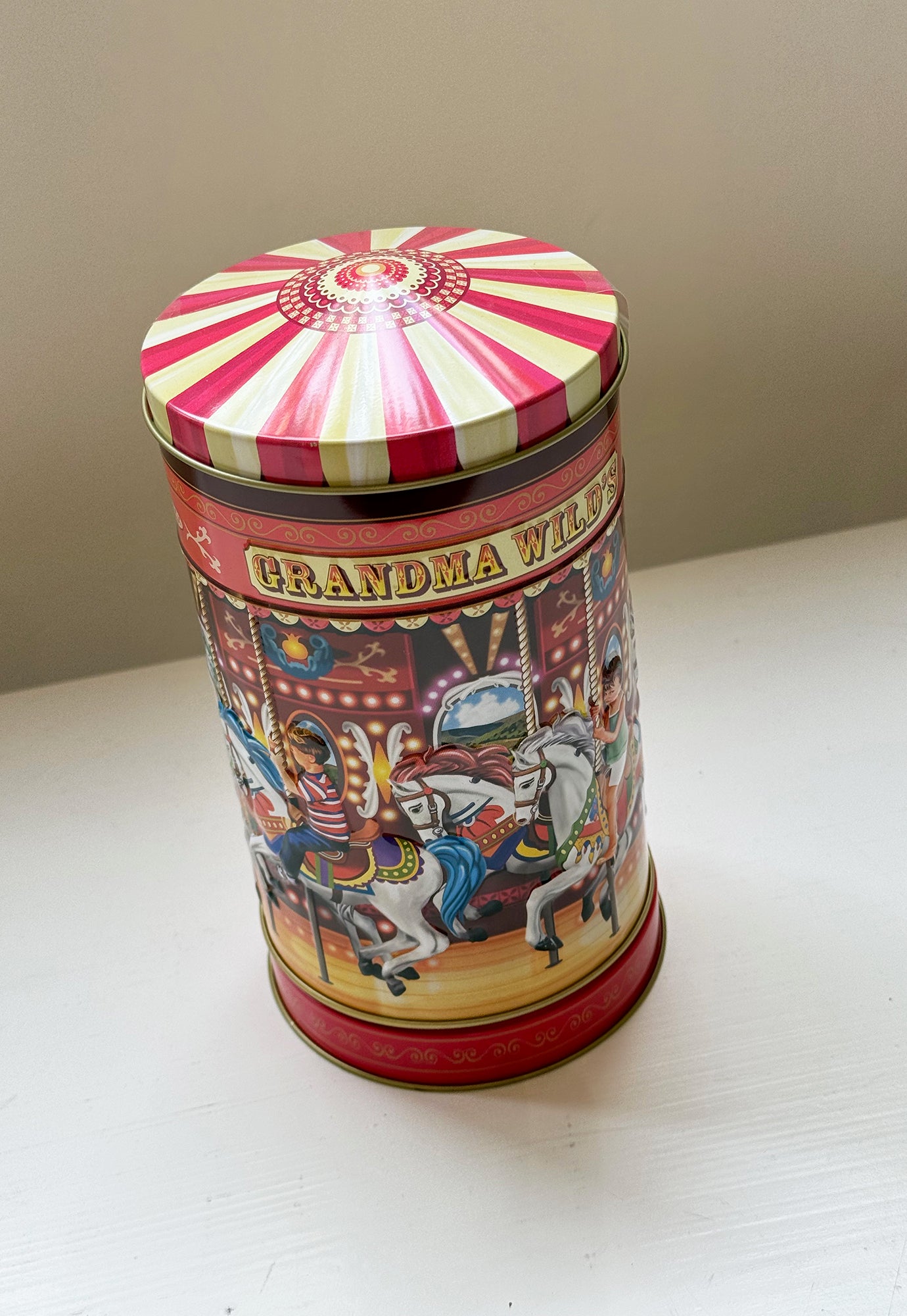 musical carousel embossed biscuit tin