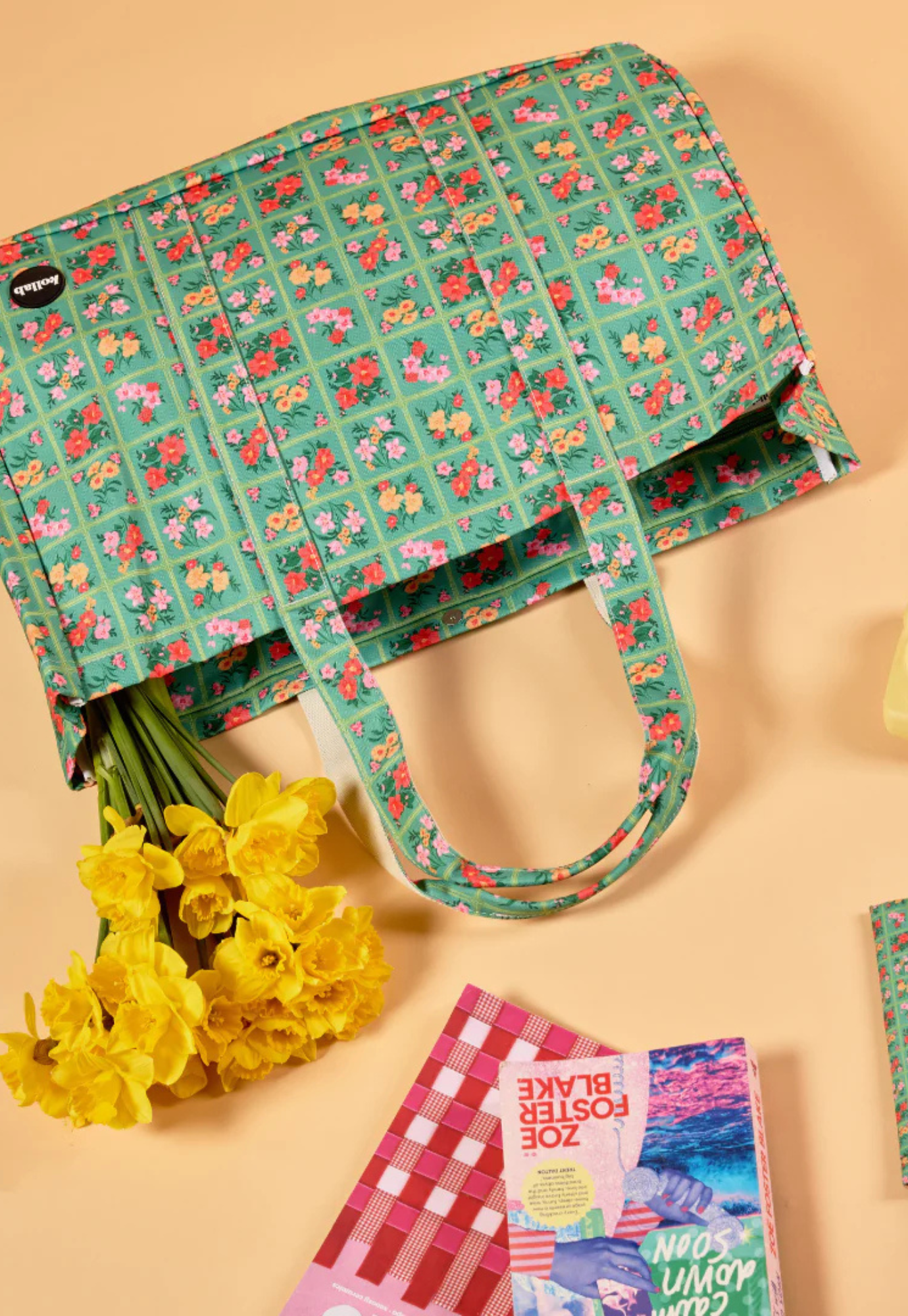 kollab carryall cargo vintage patch bag styled for beach picnic or weekend outing with vibrant pattern