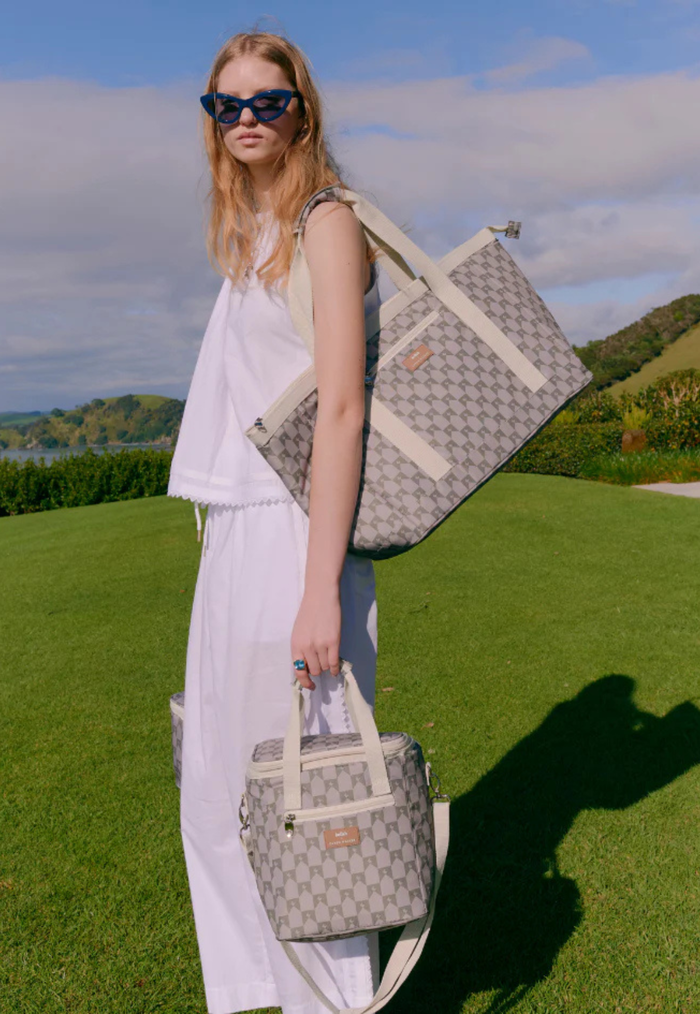 tote bag kollab x karen walker sage monogram styled with shopping, beach gear or weekend essentials outdoors