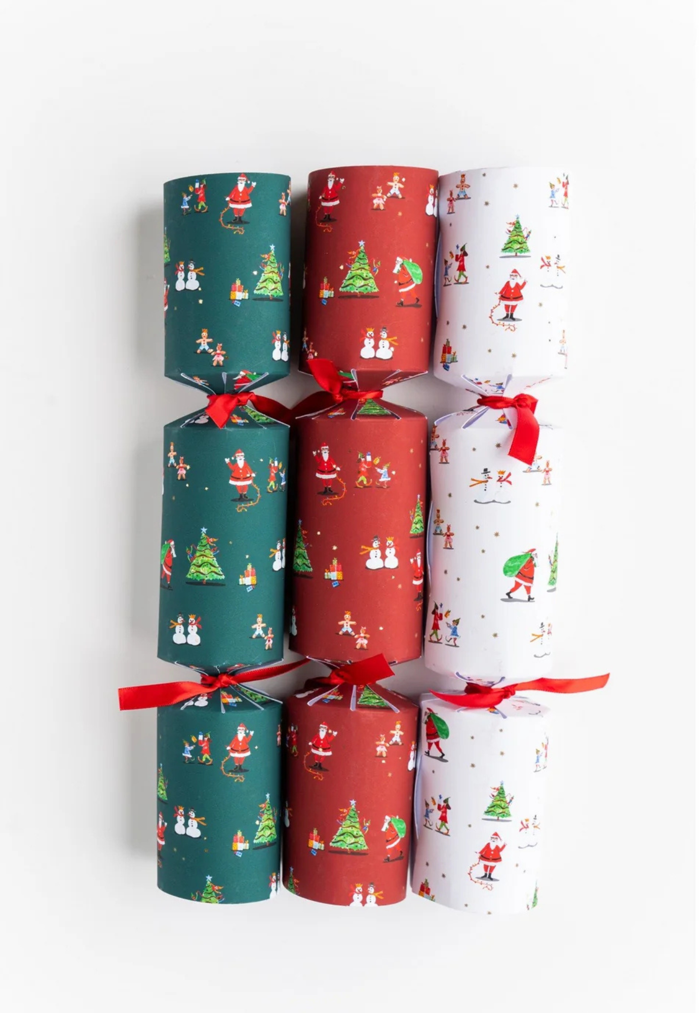 packaging of mistletoe merry mini santa friends crackers showing festive santa and christmas tree design