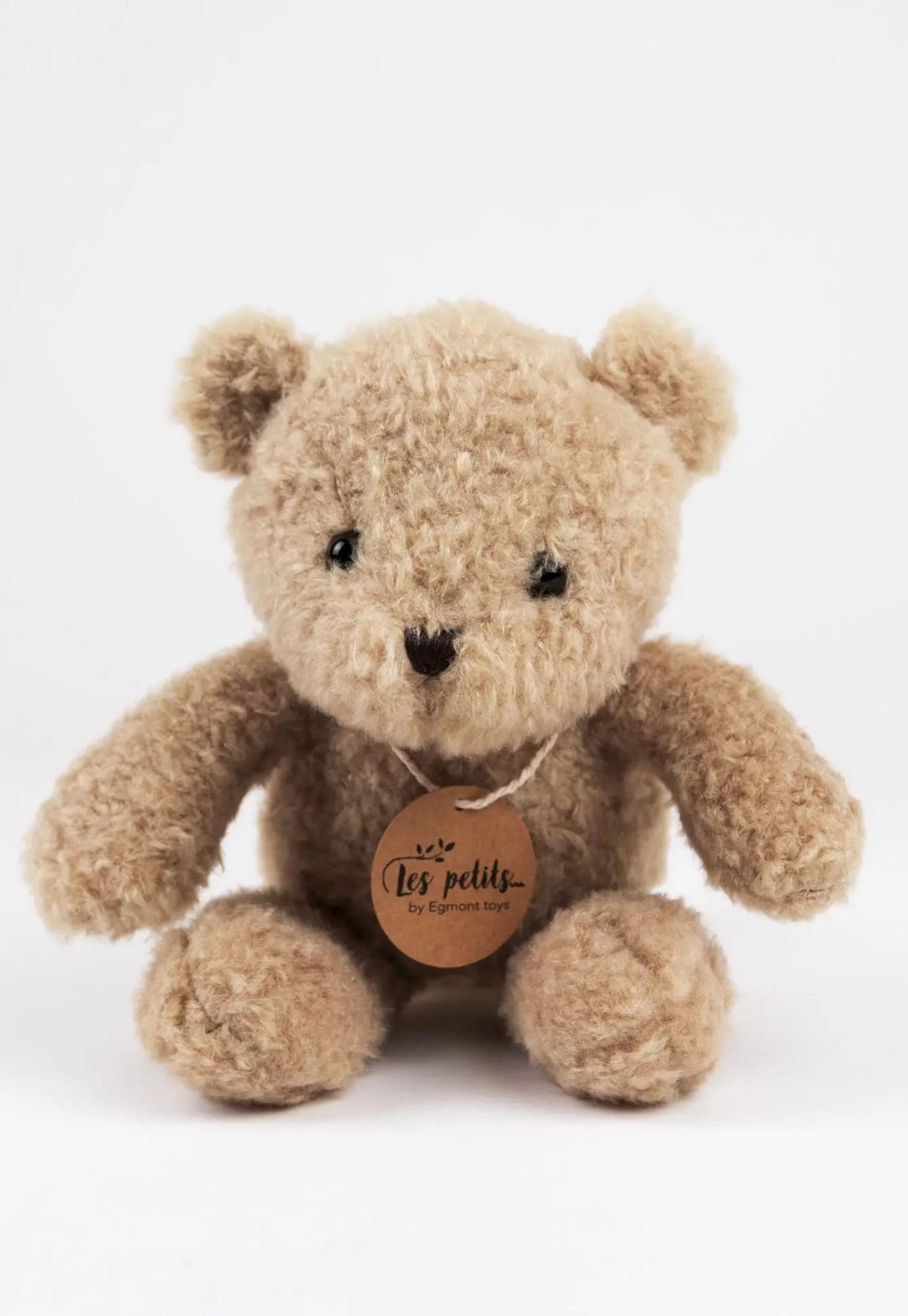 close up of morris musical bear showing soft beige plush fur and stitched details