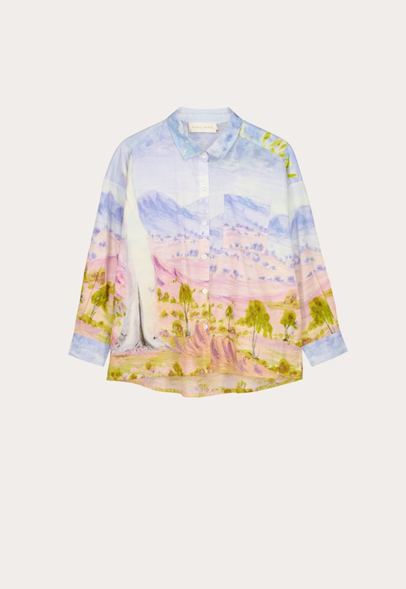 close up of nancybird sabine shirt tjoritja showing tjoritja artwork print and cotton voile texture