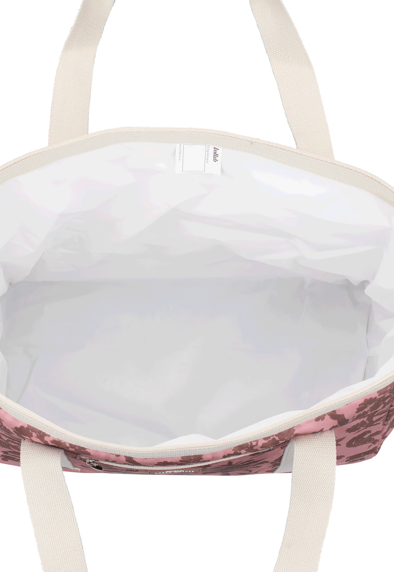 open view of tote bag kollab x karen walker animal kingdom revealing full zip top closure and spacious interior