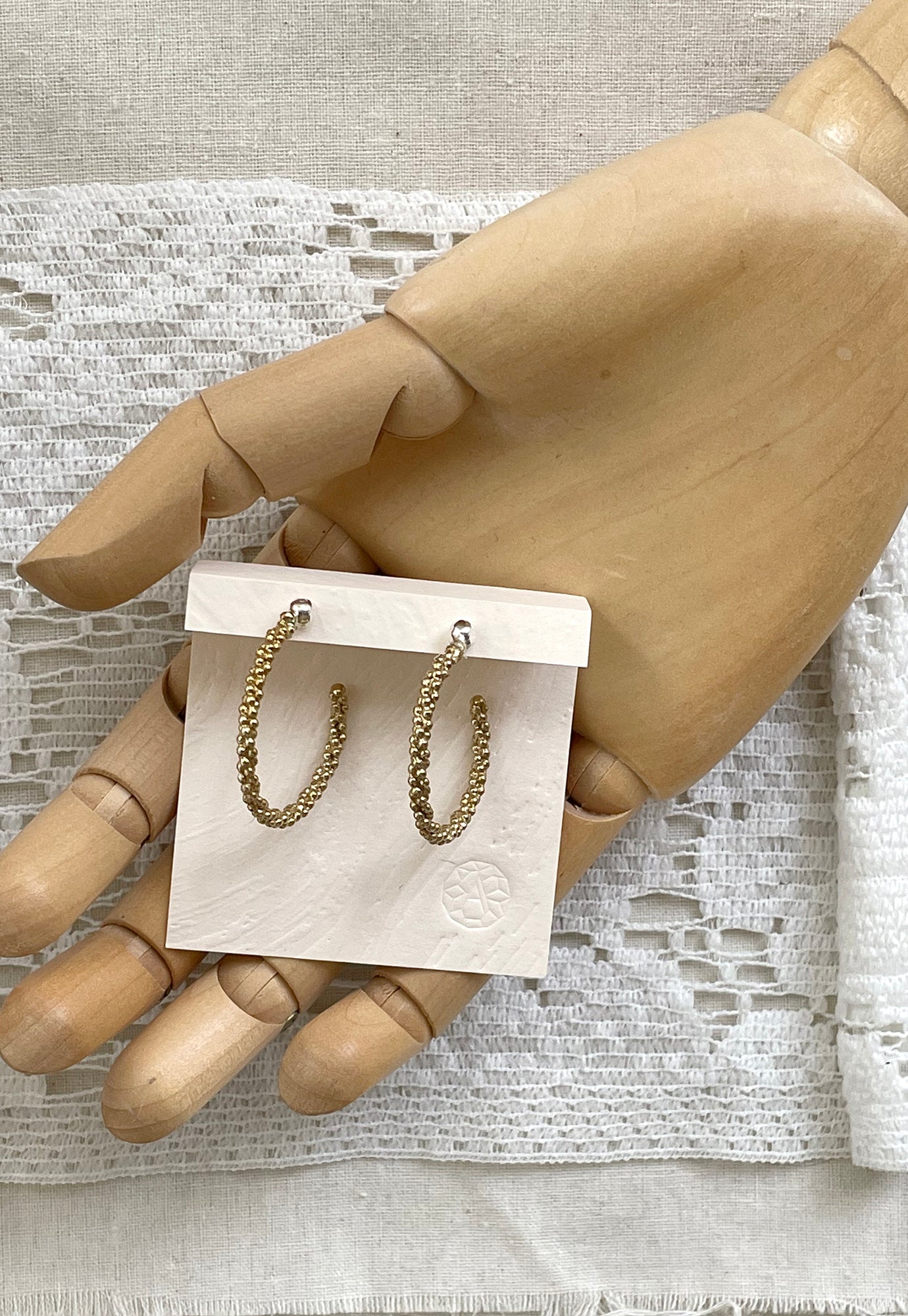 abby seymour - seed garland hoops - brass